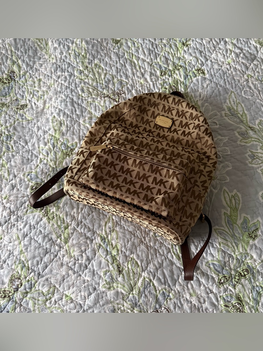 Michael Kors Monogram Logo Backpack with Gold Tone Hardware and Faux Leather Str